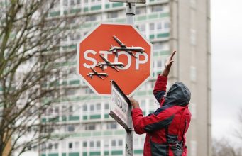 Suspect Arrested In Alleged Theft Of A Banksy Stop Sign Decorated With Military Drones Suspect Arrested In Alleged Theft Of A Banksy Stop Sign Decorated With Military Drones