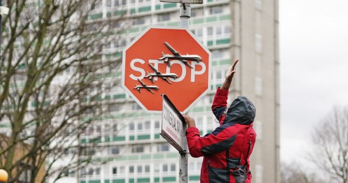 Suspect Arrested In Alleged Theft Of A Banksy Stop Sign Decorated With Military Drones Suspect Arrested In Alleged Theft Of A Banksy Stop Sign Decorated With Military Drones